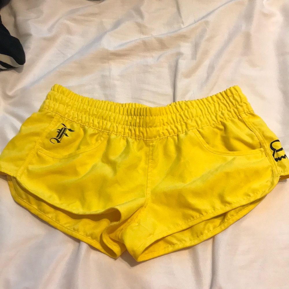Bright yellow board shorts